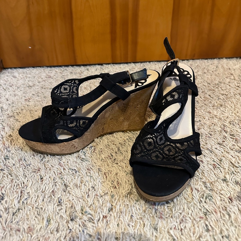 Women’s open toed Fergalicious wedges.‎